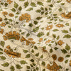 Close-up of fabric with floral pattern on beige background