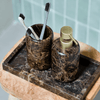 House Doctor Marble Bathroom Tray - Brown - RhoolTrayHouse DoctorMarble - textured bathroom set with toothbrush holder, toothbrush, and soap dispenser on a wooden tray.